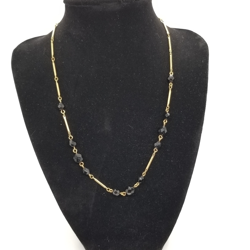 Liz Claiborne gold tone necklace with black station beads
